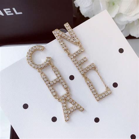 chanel gold logo drop earrings|chanel letter logo drop earrings.